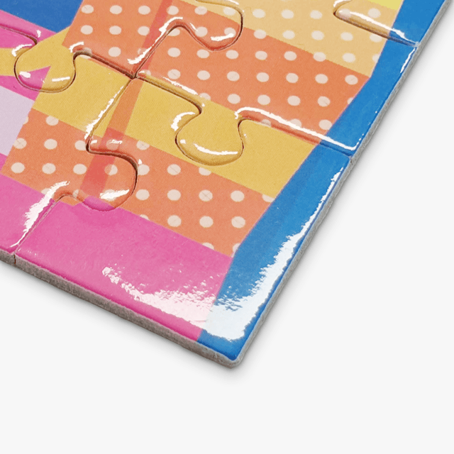 Close-up of a custom photo puzzle piece showing clean cuts and clear detail